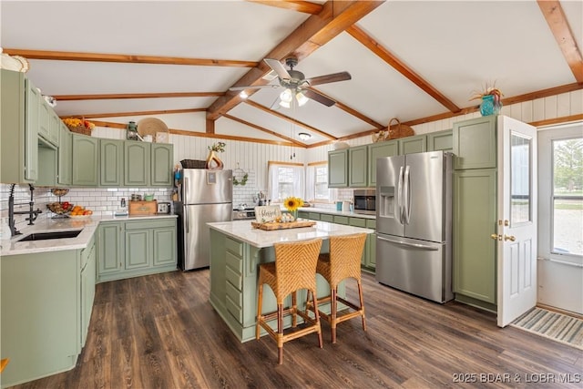 14671 Old Marvin Rd, Versailles, MO 65084 - kitchen with green cabinets, appliances with stainless steel finishes, and a sink