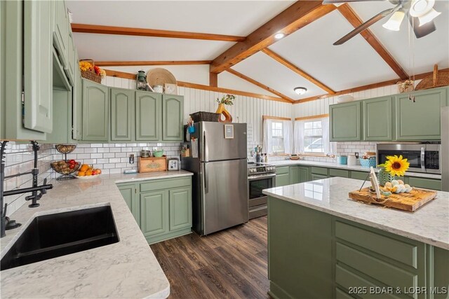 14671 Old Marvin Rd, Versailles, MO 65084 - kitchen with lofted ceiling with beams, dark wood-style floors, green cabinetry, and stainless steel appliances