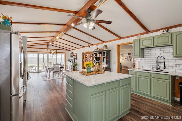 14671 Old Marvin Rd, Versailles, MO 65084 - kitchen featuring lofted ceiling with beams, freestanding refrigerator, a ceiling fan, green cabinetry, and a sink