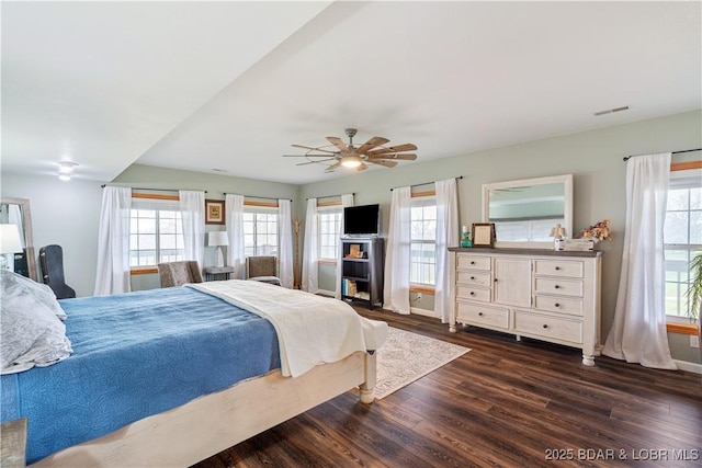 14671 Old Marvin Rd, Versailles, MO 65084 - bedroom featuring baseboards, dark wood-type flooring, multiple windows, and a ceiling fan