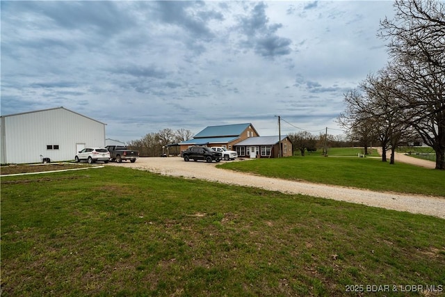 14671 Old Marvin Rd, Versailles, MO 65084 - view of yard featuring an outbuilding and dirt driveway