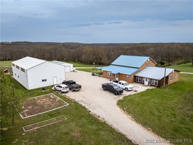 14671 Old Marvin Rd, Versailles, MO 65084 - bird's eye view with a forest view