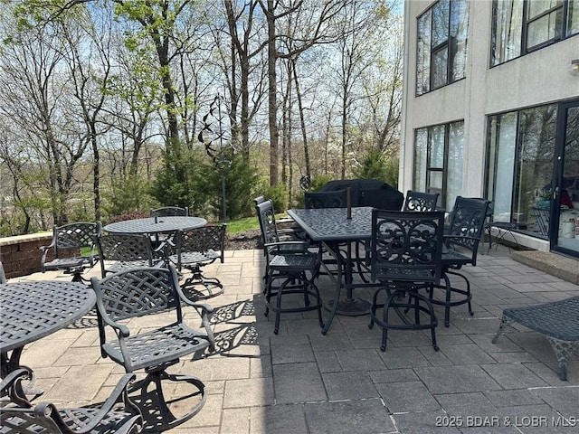 429-1D Racquet Club Dr Unit 1D, Four Seasons, MO 65049 - view of patio featuring outdoor dining area