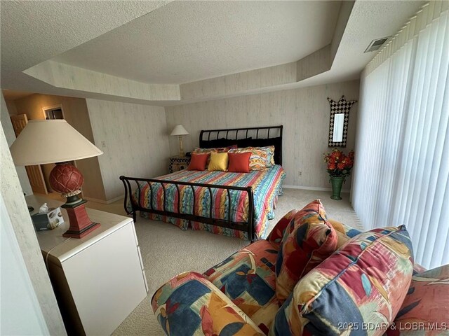 429-1D Racquet Club Dr Unit 1D, Four Seasons, MO 65049 - bedroom featuring baseboards, carpet flooring, a textured ceiling, visible vents, and a tray ceiling
