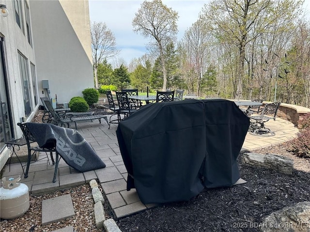 429-1D Racquet Club Dr Unit 1D, Four Seasons, MO 65049 - view of patio / terrace featuring a grill and outdoor dining space