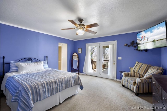 carpeted bedroom featuring access to outside, ornamental molding, baseboards, and a ceiling fan