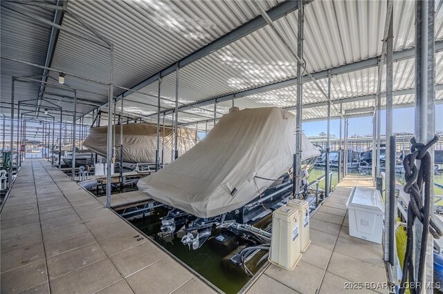 1359 Seascape Ln Unit A-501, Osage Beach, MO 65065 - dock area featuring boat lift and a water view