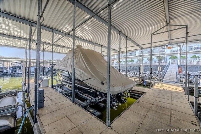 1359 Seascape Ln Unit A-501, Osage Beach, MO 65065 - dock area with boat lift and a water view