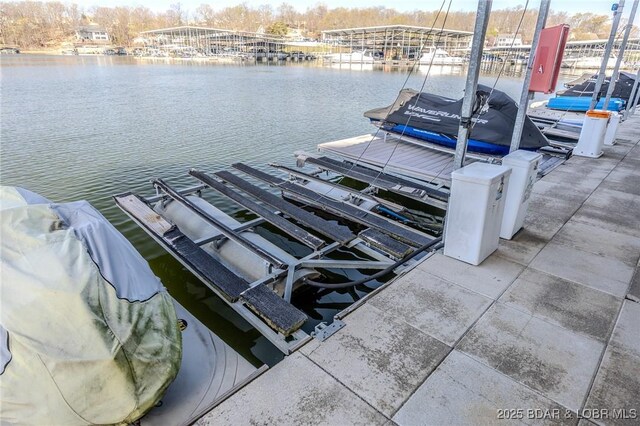 1359 Seascape Ln Unit A-501, Osage Beach, MO 65065 - dock area featuring boat lift and a water view