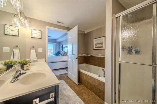 1359 Seascape Ln Unit A-501, Osage Beach, MO 65065 - ensuite bathroom with a bath, double vanity, a stall shower, and tile patterned flooring
