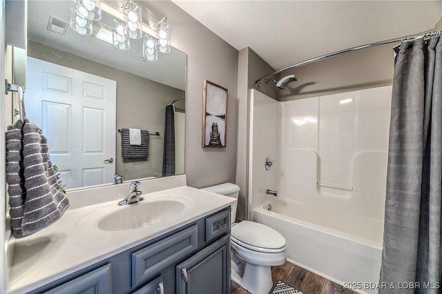 1359 Seascape Ln Unit A-501, Osage Beach, MO 65065 - full bathroom featuring toilet, shower / bath combo, vanity, and wood finished floors