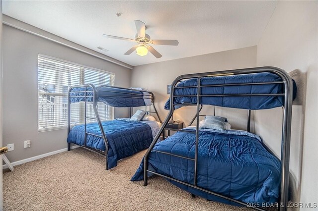 1359 Seascape Ln Unit A-501, Osage Beach, MO 65065 - bedroom featuring carpet, baseboards, and a ceiling fan