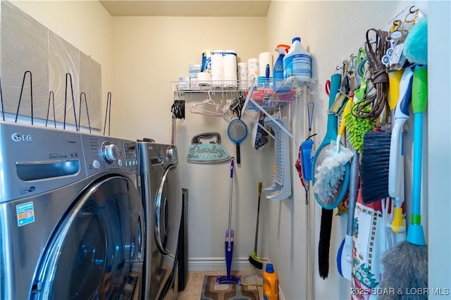5218 Big Ship St, Osage Beach, MO 65065 - washroom featuring washer and dryer, laundry area, and baseboards