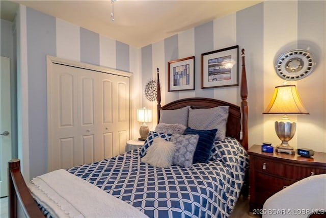 5218 Big Ship St, Osage Beach, MO 65065 - bedroom with a closet and wallpapered walls