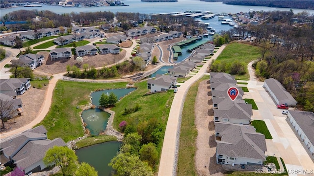 5218 Big Ship St, Osage Beach, MO 65065 - drone / aerial view with a water view and a residential view