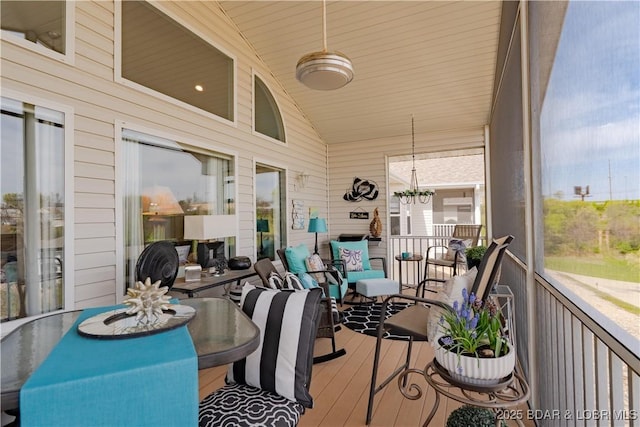 5218 Big Ship St, Osage Beach, MO 65065 - sunroom / solarium with a chandelier and plenty of natural light