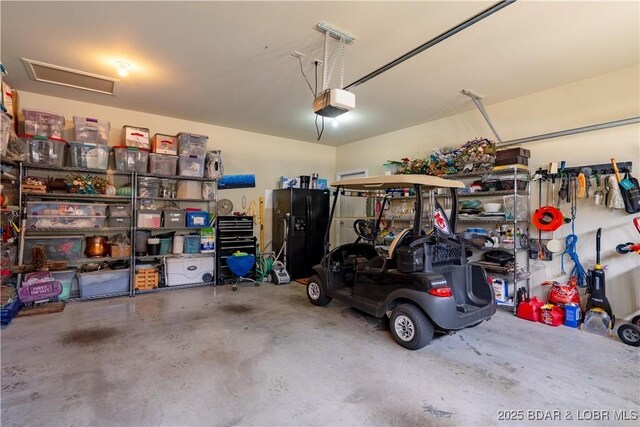 5218 Big Ship St, Osage Beach, MO 65065 - garage with a garage door opener