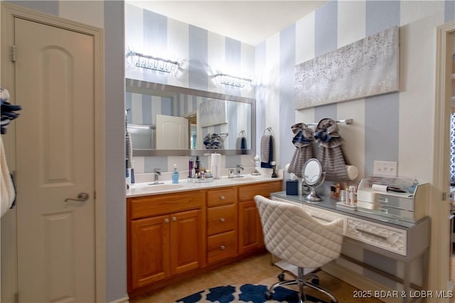 5218 Big Ship St, Osage Beach, MO 65065 - bathroom featuring wallpapered walls, double vanity, and a sink