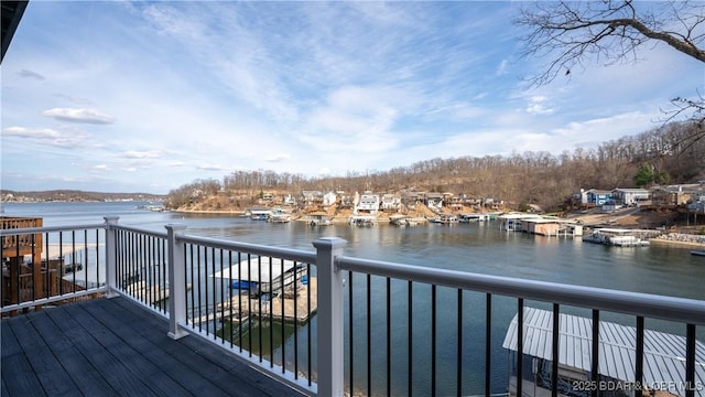 wooden terrace with a water view