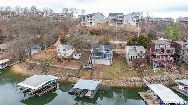 aerial view of residential area with a nearby body of water