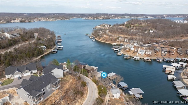 1129 Ginger Rd, Lake Ozark, MO 65049 - aerial view of property and surrounding area with a nearby body of water