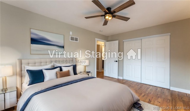 bedroom with baseboards, wood finished floors, a closet, and ceiling fan