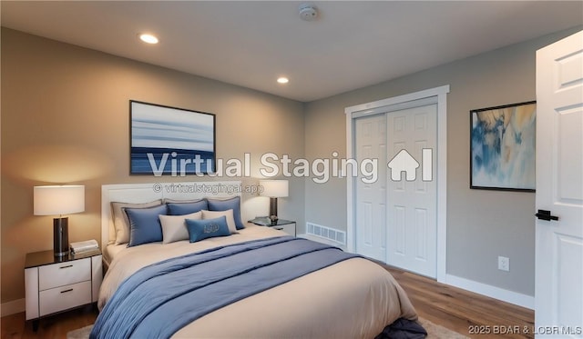 bedroom with baseboards, dark wood finished floors, a closet, and recessed lighting