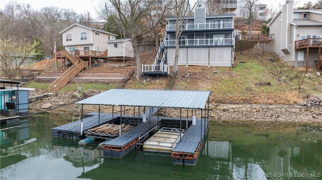1129 Ginger Rd, Lake Ozark, MO 65049 - dock area featuring stairway, a water view, and boat lift