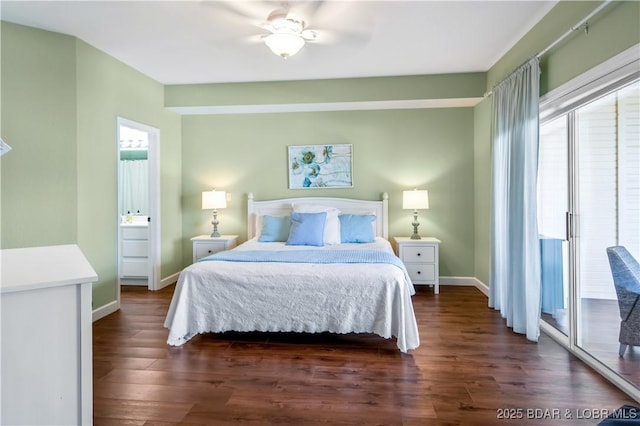 bedroom featuring multiple windows, dark wood finished floors, and baseboards