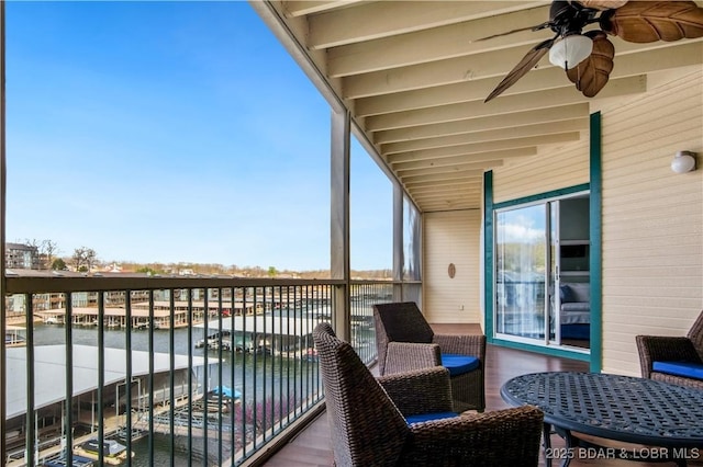 balcony featuring a ceiling fan