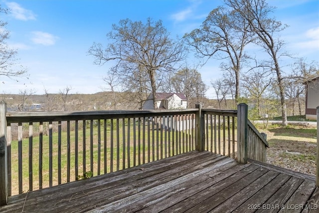 663 Highlands Dr, Camdenton, MO 65020 - wooden deck with a yard