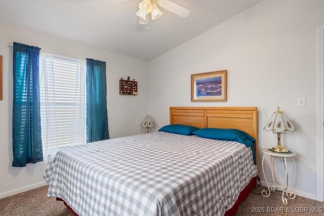 663 Highlands Dr, Camdenton, MO 65020 - bedroom with carpet floors, a ceiling fan, vaulted ceiling, and baseboards