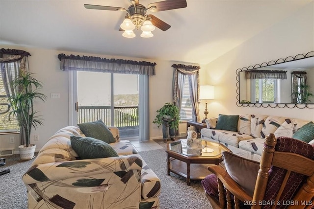 663 Highlands Dr, Camdenton, MO 65020 - living area featuring a wealth of natural light, a ceiling fan, vaulted ceiling, and baseboards