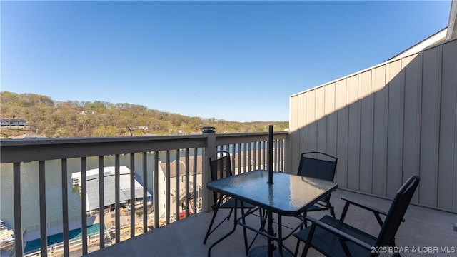 1034 Indian Pointe Unit 1034, Osage Beach, MO 65065 - wooden terrace with outdoor dining space