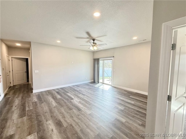245 Davis Dr, Holts Summit, MO 65043 - empty room with baseboards, a ceiling fan, wood finished floors, and a textured ceiling
