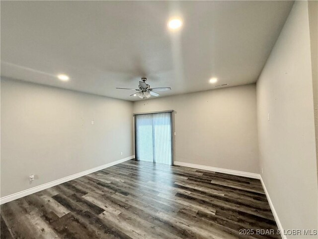 245 Davis Dr, Holts Summit, MO 65043 - empty room featuring visible vents, baseboards, recessed lighting, a ceiling fan, and dark wood-type flooring