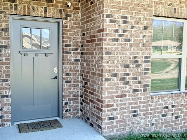 245 Davis Dr, Holts Summit, MO 65043 - view of exterior entry with brick siding