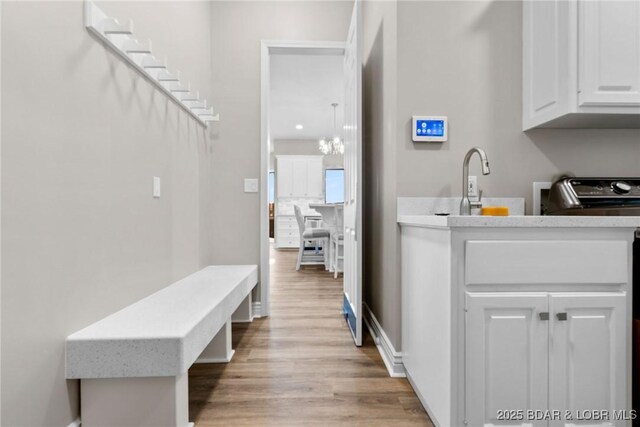 275 Waterford Ter, Sunrise Beach, MO 65079 - mudroom featuring light wood finished floors