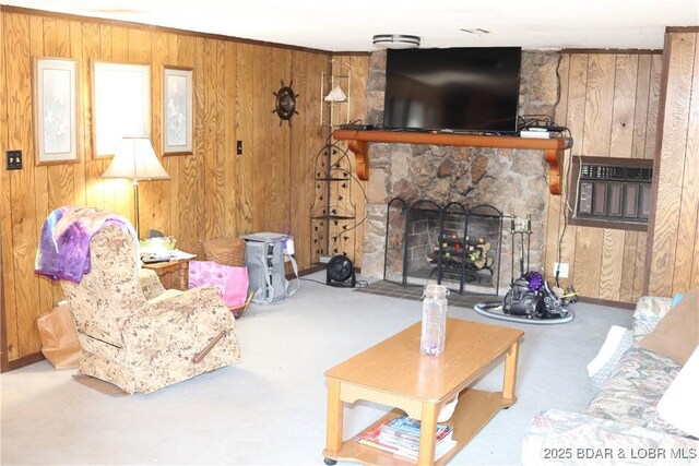 30718 Honeysuckle Rd, Gravois Mills, MO 65037 - carpeted living room with wood walls, a fireplace, and a wall unit AC