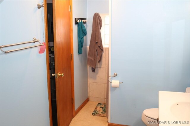 30718 Honeysuckle Rd, Gravois Mills, MO 65037 - bathroom featuring vanity and toilet