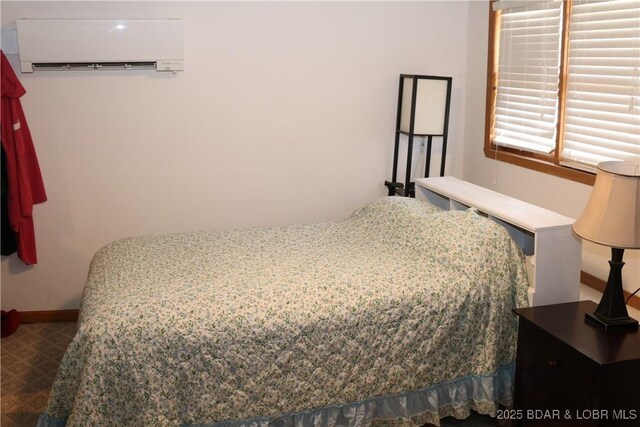30718 Honeysuckle Rd, Gravois Mills, MO 65037 - carpeted bedroom featuring a wall mounted air conditioner and baseboards