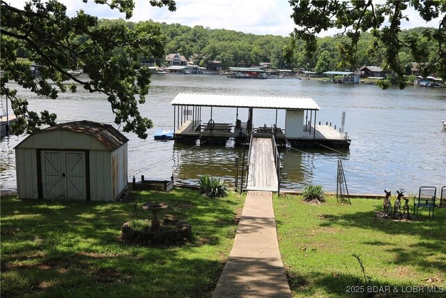 30718 Honeysuckle Rd, Gravois Mills, MO 65037 - dock with a water view, a yard, and boat lift