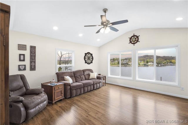 living area featuring recessed lighting, lofted ceiling, dark wood-style floors, baseboards, and ceiling fan