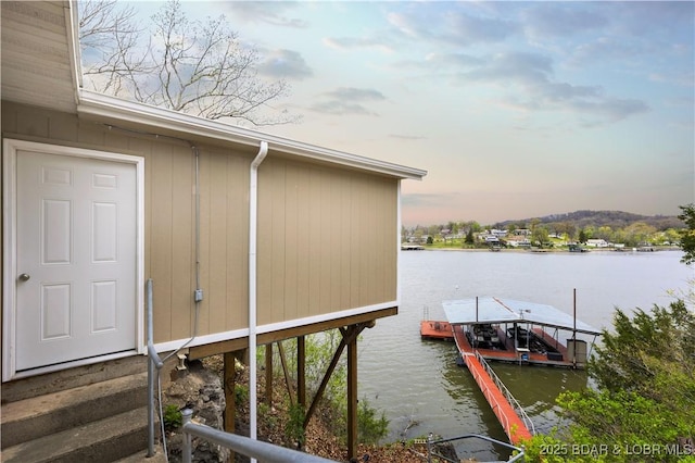 dock area featuring a water view