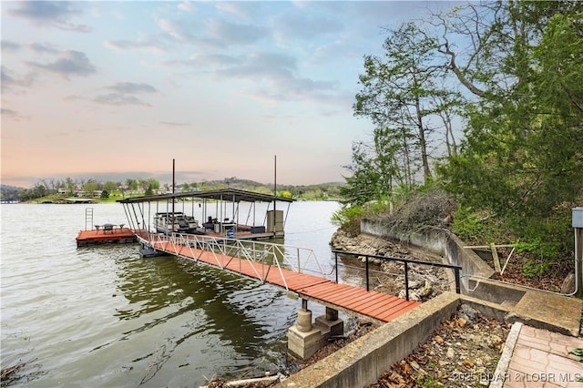 view of dock with a water view