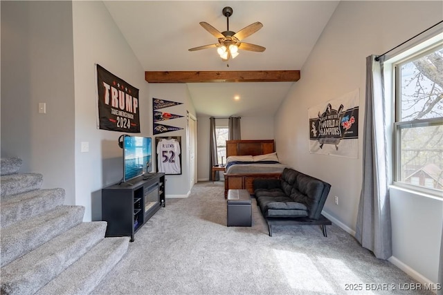 bedroom featuring lofted ceiling with beams, baseboards, and carpet