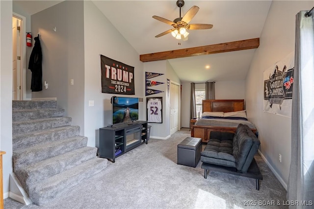 living room featuring a ceiling fan, carpet floors, baseboards, lofted ceiling with beams, and stairs