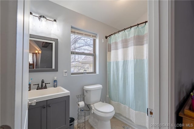 full bathroom featuring toilet and vanity