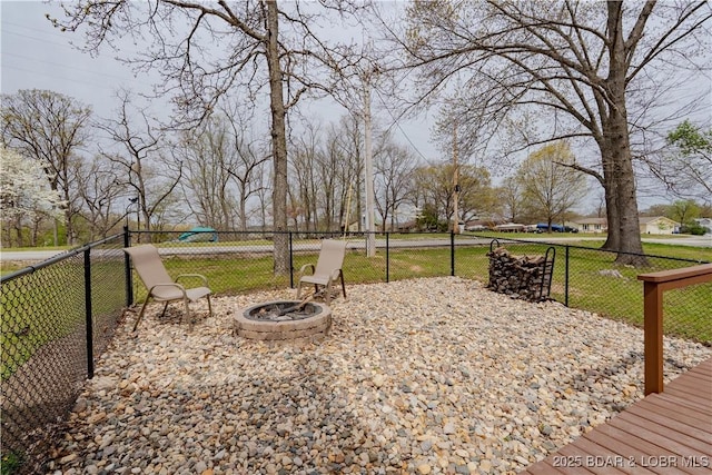 exterior space featuring a lawn and fence