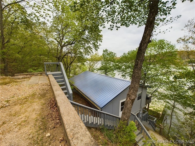 24930 Leona Ln, Versailles, MO 65084 - exterior space featuring stairs and metal roof